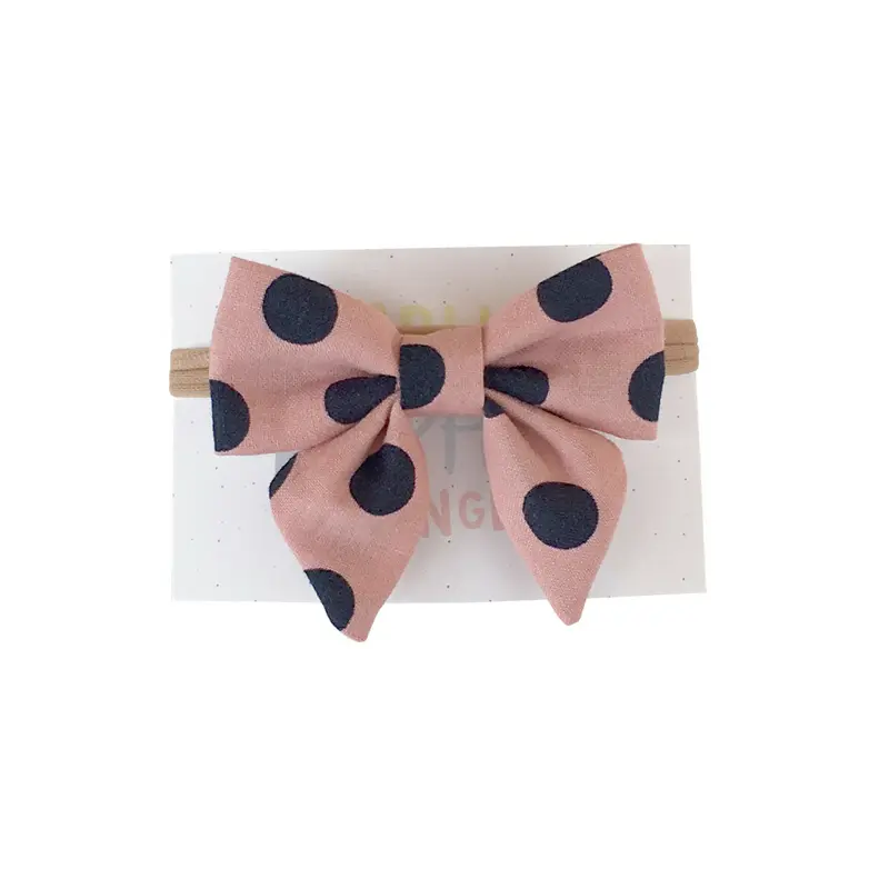 Hairbow | Navy dots on Blush